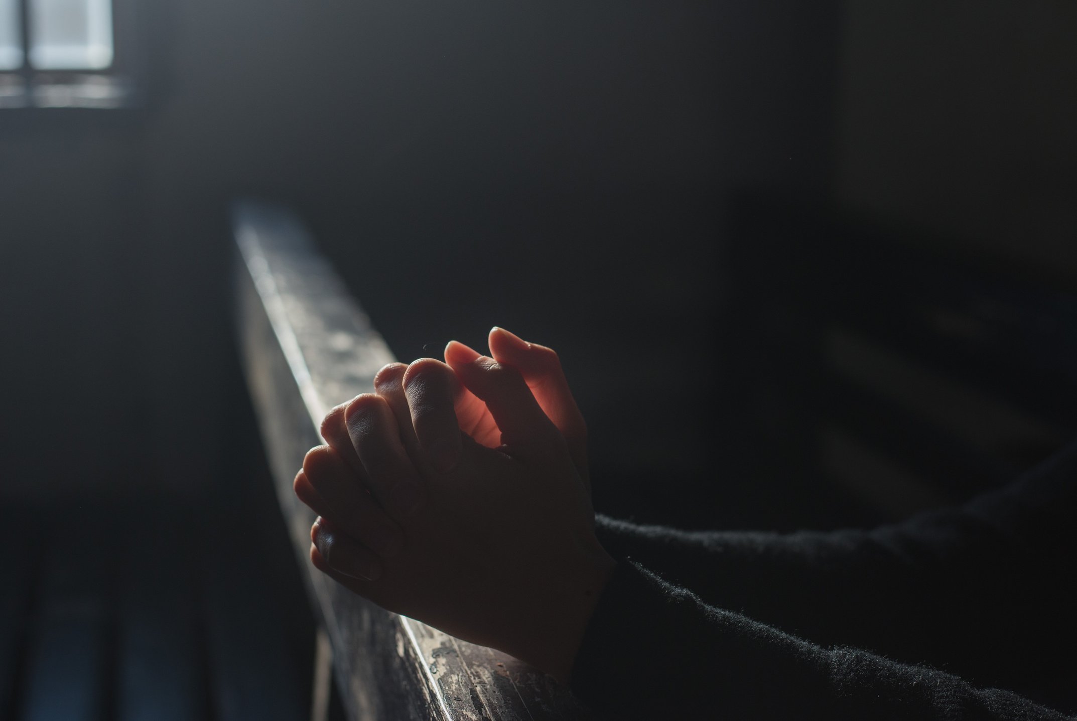 Person Praying in the Church