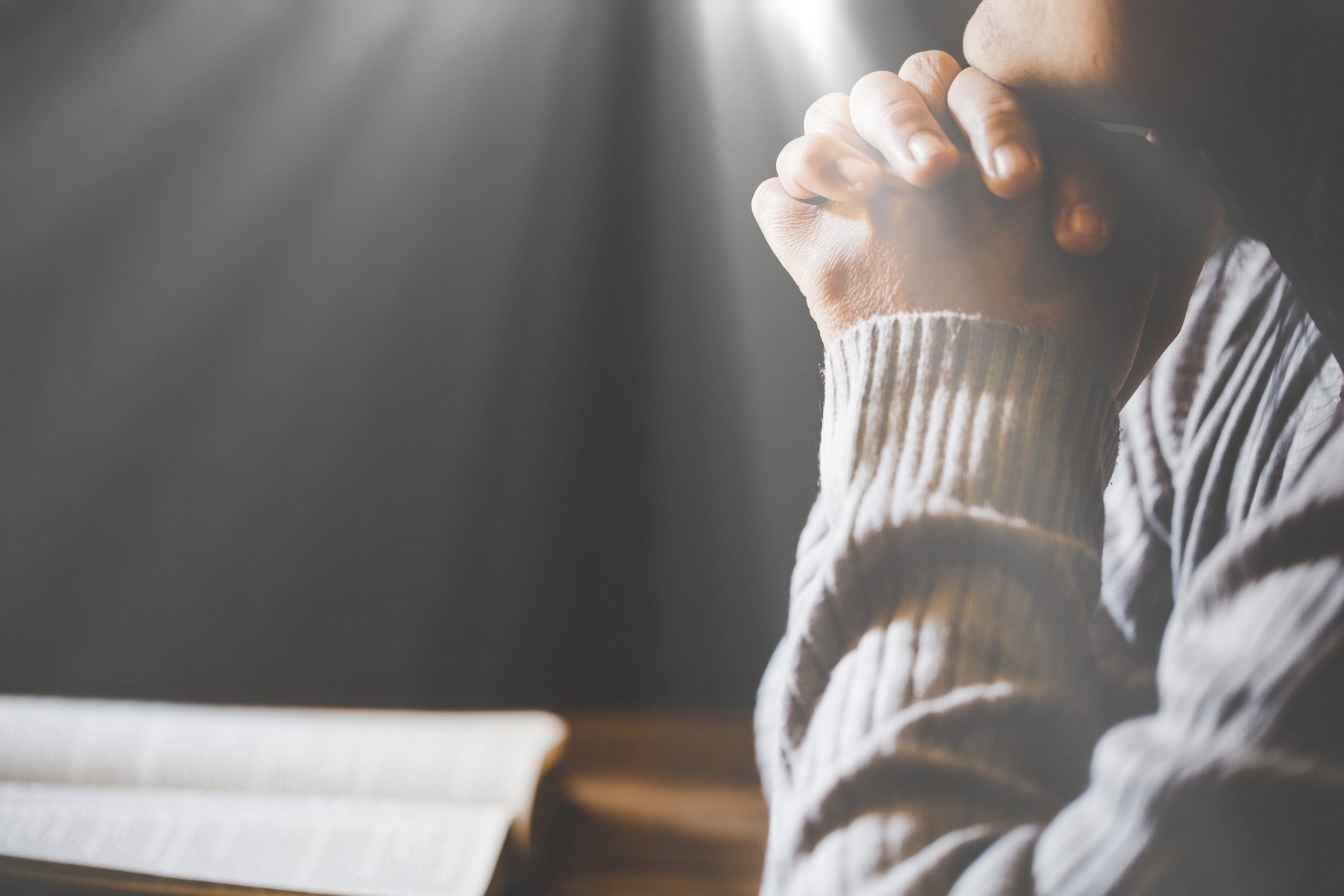 Person Praying Deeply